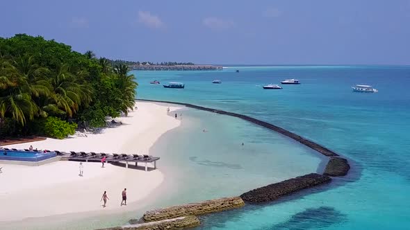 Aerial scenery of coast beach journey by blue lagoon and sand background