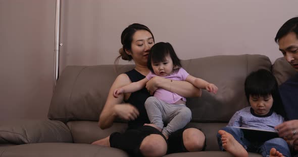 Family enjoying time relaxing together at home