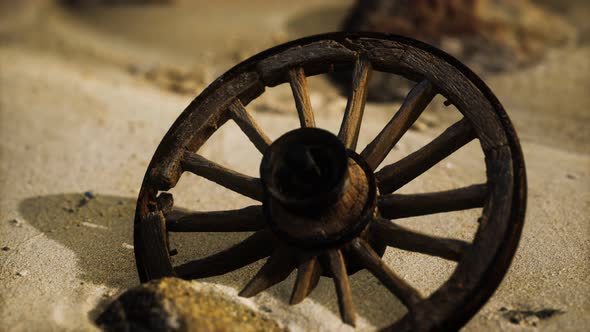 Large Wooden Wheel in the Sand alt