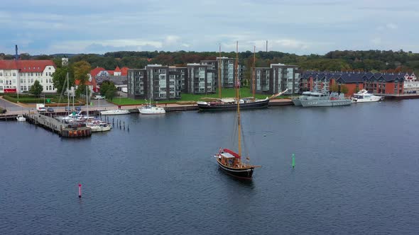 Yacht on the Background of the City of Denmark