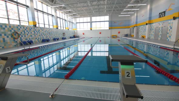 Swimming Pool with Clear Water Separators and Ramps in Hall