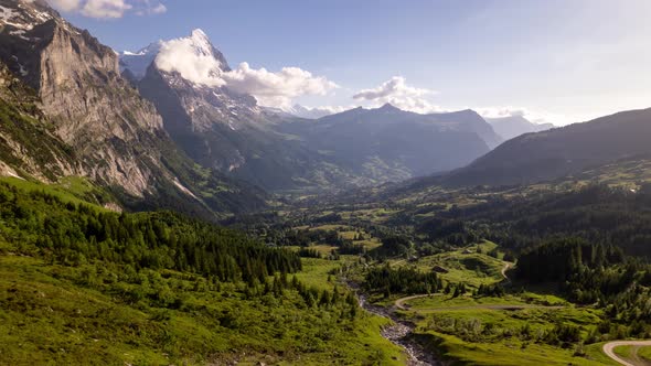 Hyperlapse of stunning mountainscape in Grindelwald in the Swiss Alps, flying towards Eiger North Fa