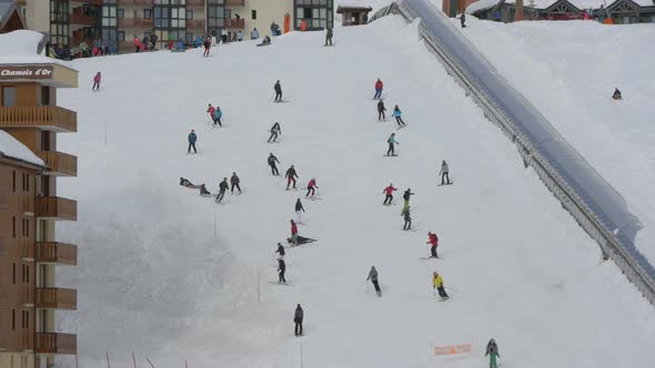 People skiing on a ski slope 