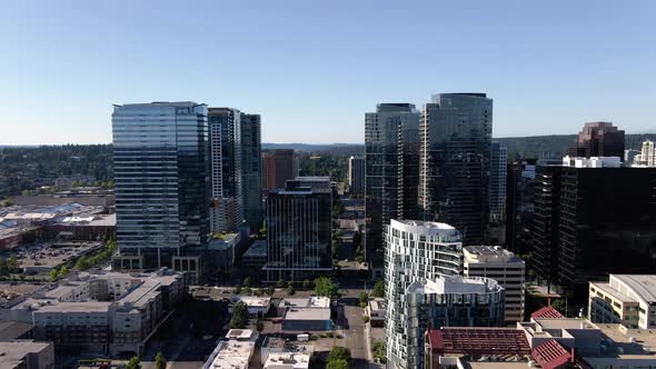 Business Background Of Aerial Flying Through Tall Buildings In Modern Metropolis