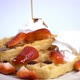 Pouring Maple Syrup on Waffles with Strawberries - VideoHive Item for Sale