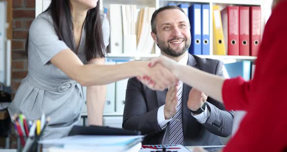 Successful Business People Shake Hands When Finishing Meeting