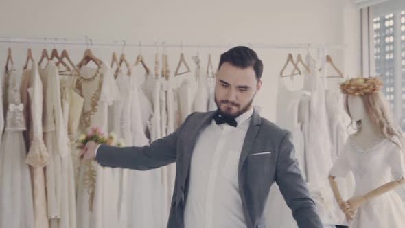 Funny Groom Man Wearing Wedding Clothes Dance in Dressing Room