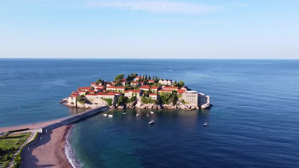 Drone View of Sea Horizon and Small Island with Old Buildings