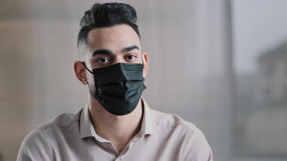 Hispanic Male Businessman Arab Man Sick Guy in Casual Shirt Wears Black Medical Mask Protective