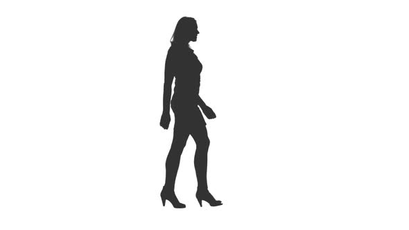 Silhouette of Young Beautiful Woman Walks on High Heels