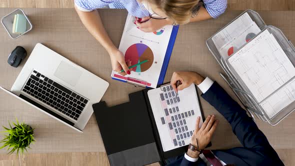 Corporate Financial Strategy Business Meeting Top View of Businessman and Businesswoman