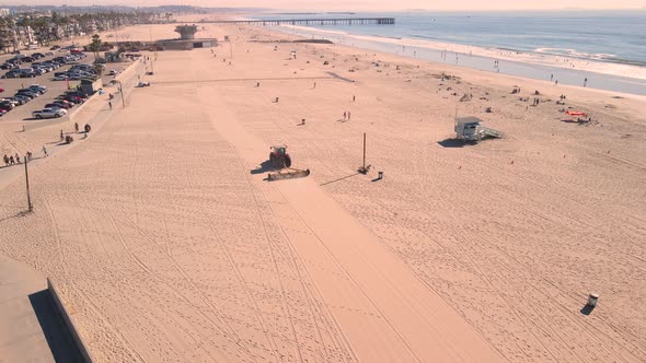 Aerial footage of Venice Beach. Bikes and runners.