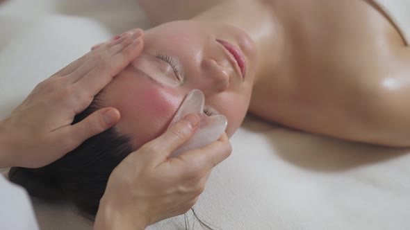 Face Massage with Gouache Stones at the Spa