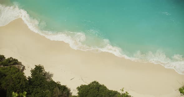 Blue Waves on Sandy Beach