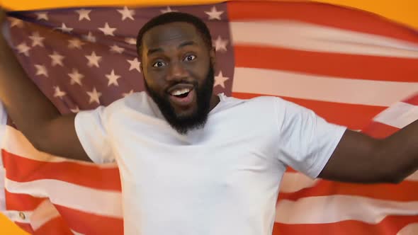 Black Young Man With American Flag Supporting National Team, Sport Excitement