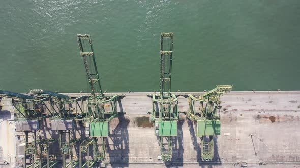 Container cargo freight ship at landmark Santos harbor port Brazil.