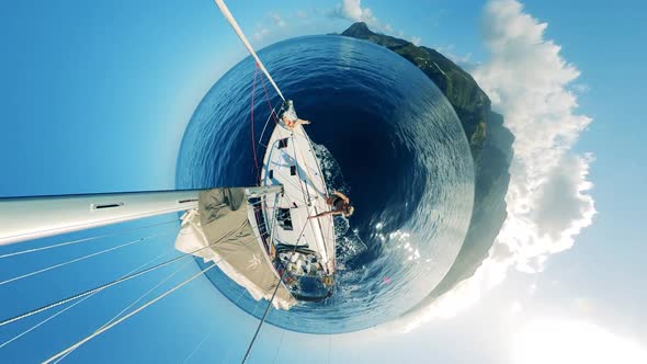 Round Panorama of an Island and a Sailboat Floating Near