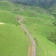 Cars passing through curve in mountainous road. Mountain serpentine road - VideoHive Item for Sale
