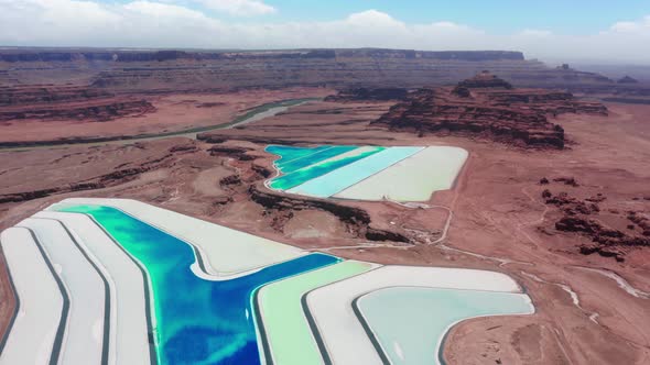 Amazing Vibrant Blue Manmade Lakes in Red Desert Landscape of Another Planet