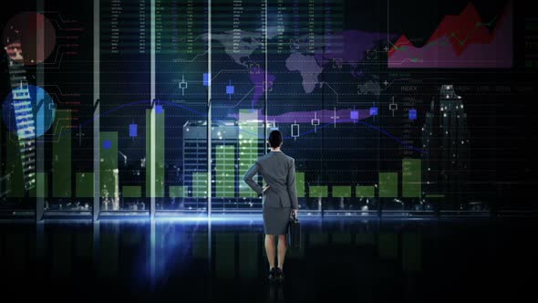 Rearview of businesswoman looking at digital animation of glowing graph interface