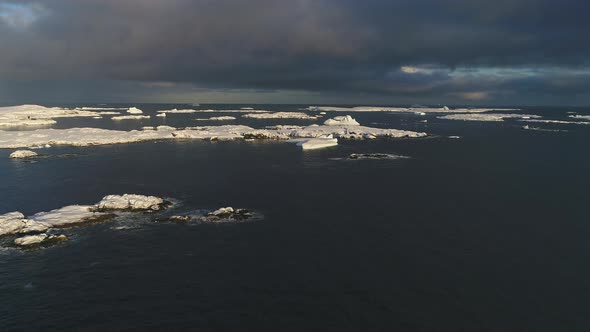 Antarctica Aerial Front View Over Snowy Islands