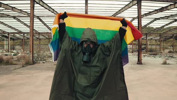 Boy in Ukrainian War with Peace Flag Walks in an Abandoned Hangar