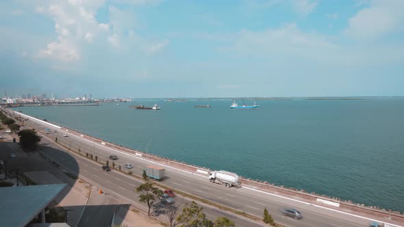 Timelapse Traffic Car on Busy a Day, Panoramic View of Seascape at the Boulevard