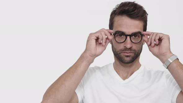 Guy Adjusting Spectacles