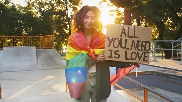 Afroamerican Girl in Multicolored LGBT Pride Flag