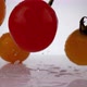 Camera follows cherry tomatoes falling on surface. Slow Motion. - VideoHive Item for Sale