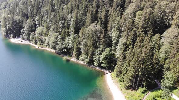 beautiful drone video of an lake and mountains, eibsee in bavaria