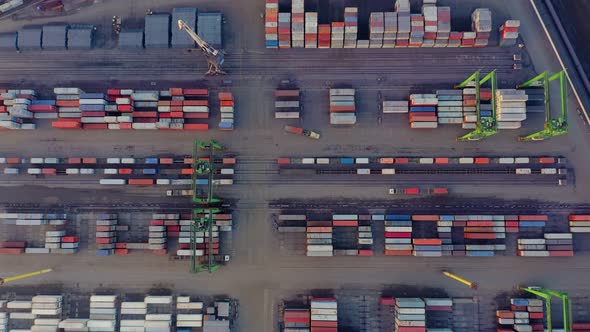 Aerial View of Trucks Unloading at the Port Container Terminal