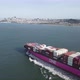 Big Commercial Ship is crossing the Bay + San Francisco skyline is in the background - VideoHive Item for Sale