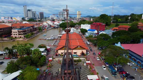 Epic aerial shot of historic war ship,river and old buildings in malacca,Malaysia,Asia.