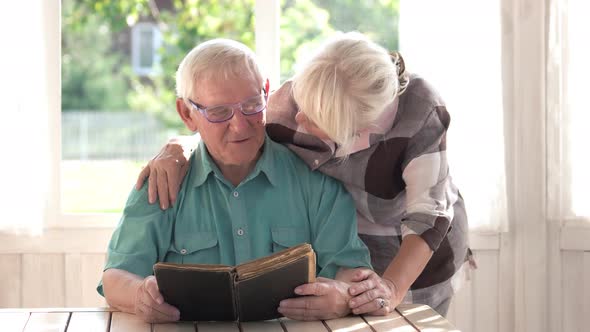 Senior Couple and Book.