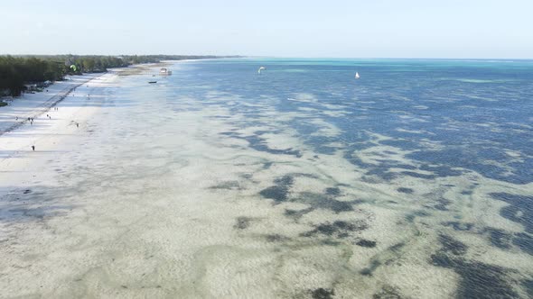 Kitesurfing Near the Shore of Zanzibar Tanzania