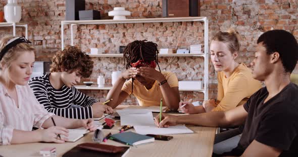 Slow motion shot of students studying in a group