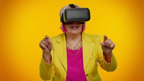 Elderly Stylish Granny Woman Using Headset Helmet App to Play Simulation Virtual Reality VR Game