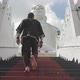 Man Climbs Stairs to Temple - VideoHive Item for Sale