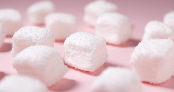 Marshmallow candy on pink 