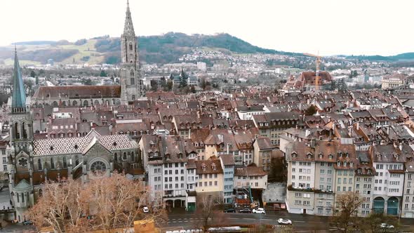 Aerial slide Pan over Cathedral of Bern and City Center, Switzerland