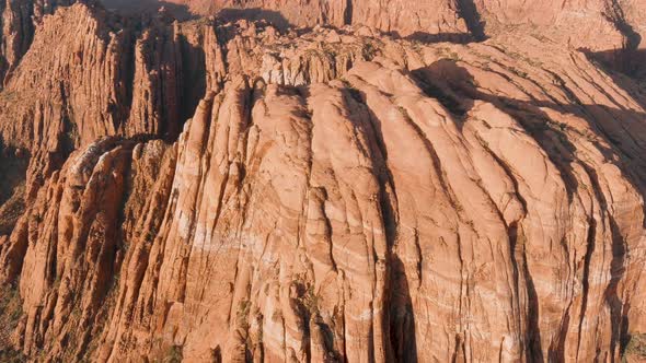 Aerial shot showing the majestic magnitude of Snow Canyon's lava mountains.