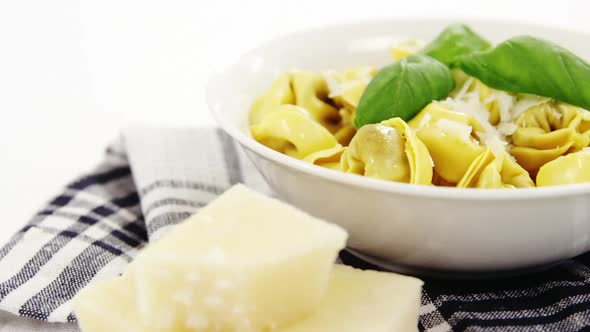 Bowl of cooked pasta with cheese