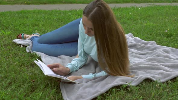 Girl Relax in the Park Reads Book