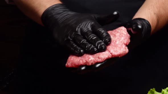 Chef Mixing Ground Beef and Shaping a Burger Patty