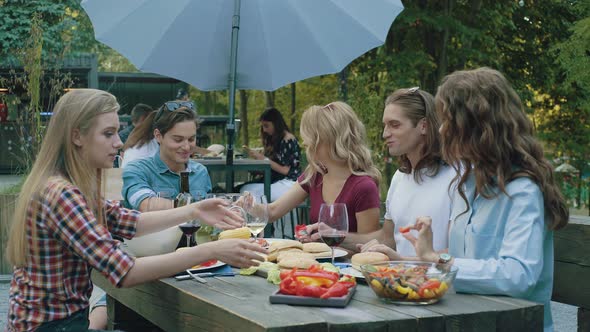 People Eating Healthy Food On Outdoor Party