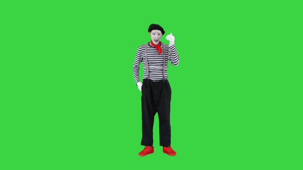 Mime Talking on Imaginary Phone on a Green Screen Chroma Key