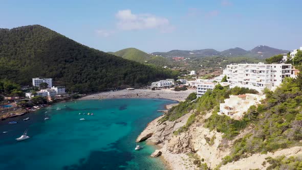 Aerial footage of the Spanish island of Ibiza showing the beautiful beach front