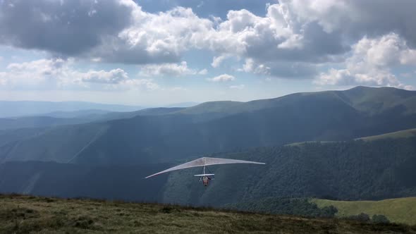 Hang glider in the air. Aerial footage of extreme sports