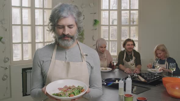 Portrait Of Adult Man At Cooking Class